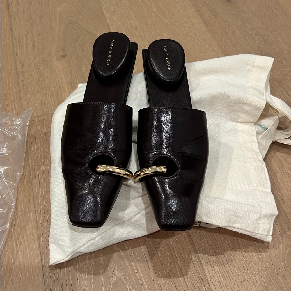 Tory Burch Brown pierced Leather Mules with Gold Accent